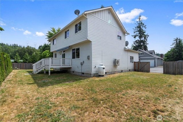 1611 Austin Ave, Snohomish, WA 98290 - rear view of property with crawl space, a fenced backyard, board and batten siding, and a wooden deck