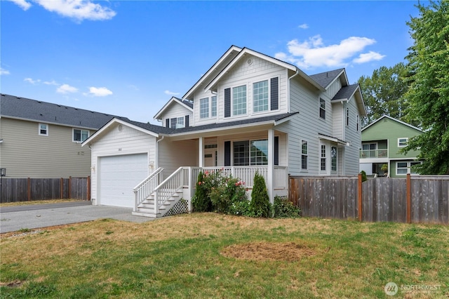 1611 Austin Ave, Snohomish, WA 98290 - traditional home featuring covered porch, asphalt driveway, and an attached garage