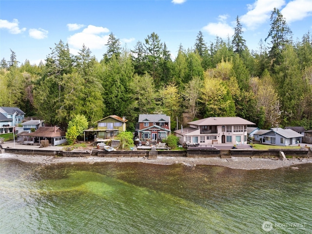 80 E Rose Point Ln, Belfair, WA 98528 - rear view of house with a residential view and a deck with water view