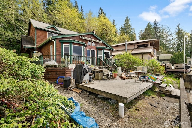 80 E Rose Point Ln, Belfair, WA 98528 - back of house with a deck