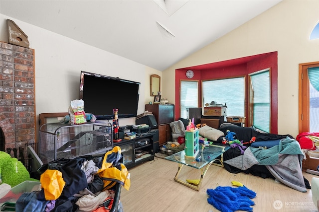 80 E Rose Point Ln, Belfair, WA 98528 - living room featuring vaulted ceiling and wood finished floors