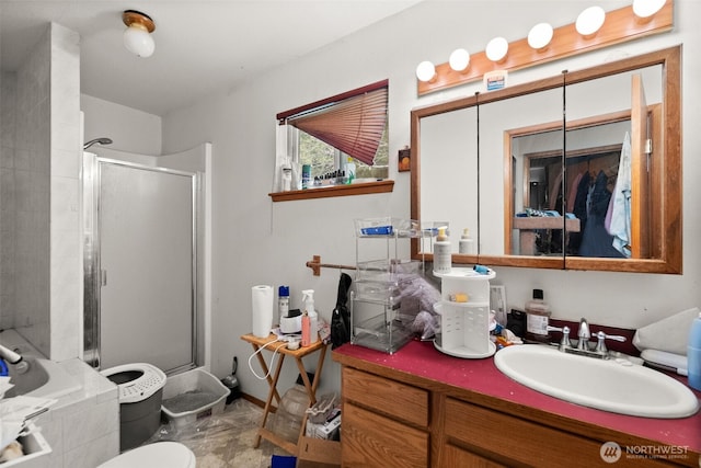 80 E Rose Point Ln, Belfair, WA 98528 - full bathroom with a shower stall, vanity, and tiled tub