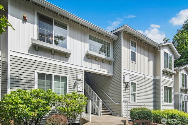3006 SE 8th St Unit 2120, Renton, WA 98058 - view of property featuring stairway