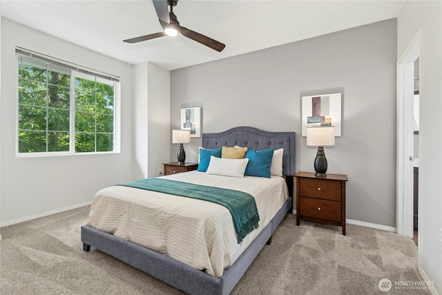 3006 SE 8th St Unit 2120, Renton, WA 98058 - carpeted bedroom with baseboards and a ceiling fan