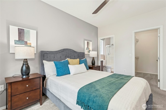3006 SE 8th St Unit 2120, Renton, WA 98058 - bedroom featuring carpet flooring, ensuite bathroom, a walk in closet, and ceiling fan
