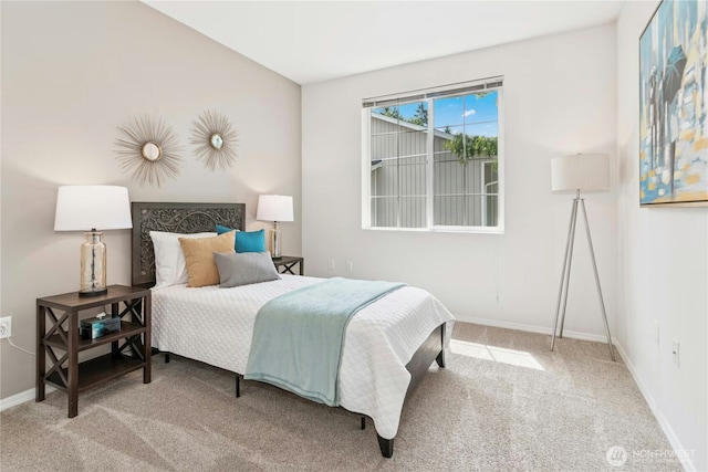 3006 SE 8th St Unit 2120, Renton, WA 98058 - bedroom with carpet flooring and baseboards