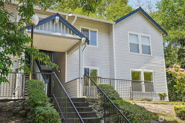33020 10th Ave SW Unit E204, Federal Way, WA 98023 - view of front facade featuring stairs