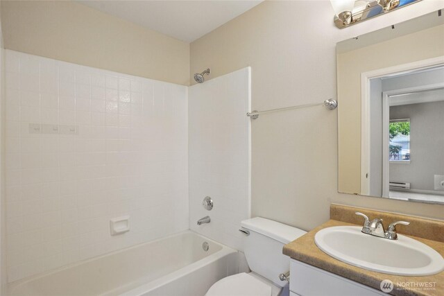 33020 10th Ave SW Unit E204, Federal Way, WA 98023 - bathroom featuring vanity, washtub / shower combination, and baseboard heating
