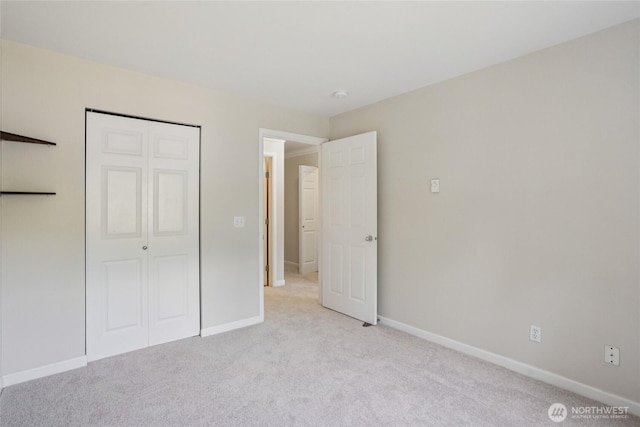 33020 10th Ave SW Unit E204, Federal Way, WA 98023 - unfurnished bedroom with carpet floors and a closet