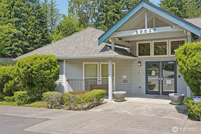 33020 10th Ave SW Unit E204, Federal Way, WA 98023 - view of front facade with a shingled roof