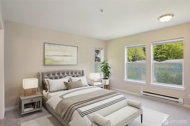 33020 10th Ave SW Unit E204, Federal Way, WA 98023 - carpeted bedroom with a baseboard radiator and multiple windows