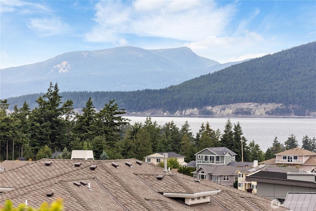 2204 Dublin Pl, Anacortes, WA 98221 - view of mountain background featuring a large body of water and a heavily wooded area