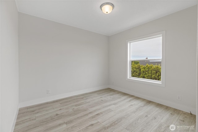 2204 Dublin Pl, Anacortes, WA 98221 - unfurnished room with light wood-style floors and baseboards