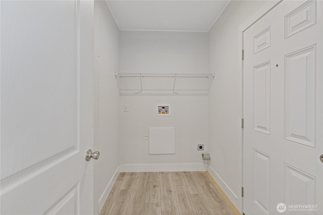2204 Dublin Pl, Anacortes, WA 98221 - laundry area with hookup for an electric dryer, light wood finished floors, and hookup for a washing machine