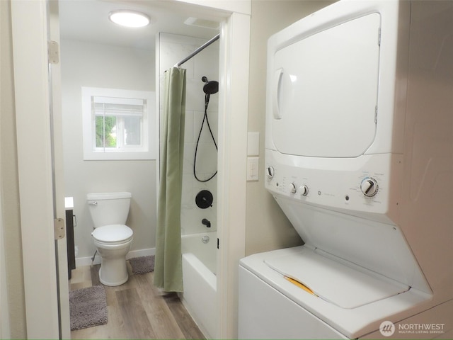 14806 131st Ave SE, Renton, WA 98058 - laundry area featuring stacked washer / drying machine and light wood-type flooring