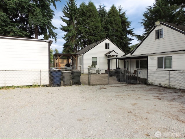 14806 131st Ave SE, Renton, WA 98058 - back of house with a pergola