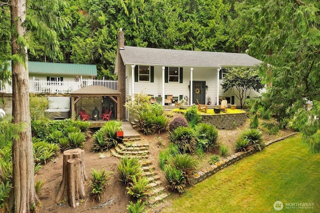 2815 Willis St, Bellingham, WA 98225 - view of front of property with a gazebo, a chimney, and a wooden deck