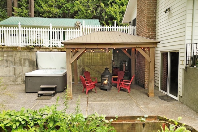 2815 Willis St, Bellingham, WA 98225 - view of patio with a gazebo, an outdoor fire pit, and a hot tub
