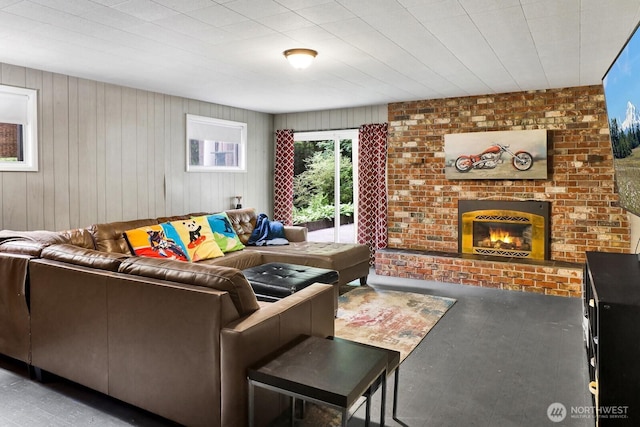 2815 Willis St, Bellingham, WA 98225 - living room featuring a brick fireplace, wooden walls, and wood finished floors
