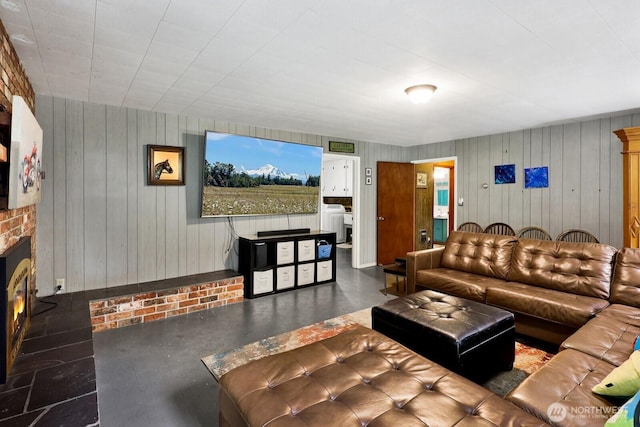 2815 Willis St, Bellingham, WA 98225 - living room with plenty of natural light, wooden walls, and a fireplace