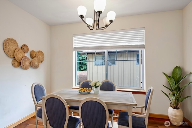 10736 Whitman Ave N, Seattle, WA 98133 - dining area featuring a chandelier and wood finished floors
