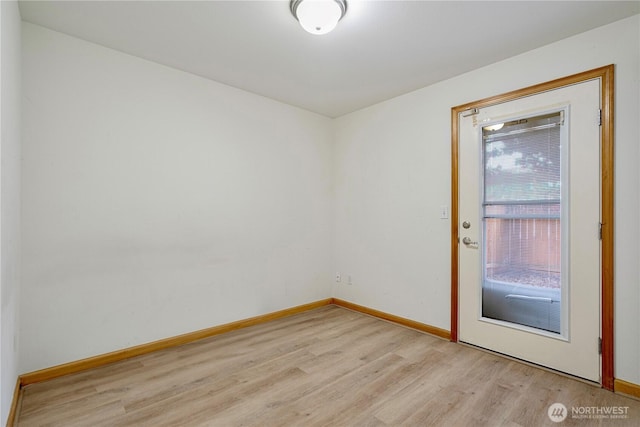 10736 Whitman Ave N, Seattle, WA 98133 - spare room featuring light wood finished floors and baseboards