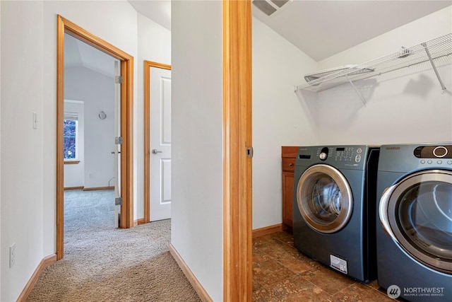 10736 Whitman Ave N, Seattle, WA 98133 - washroom with washer and clothes dryer and dark colored carpet