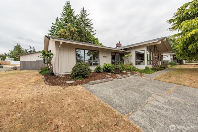 2130 W 4th, Port Angeles, WA 98363 - mid-century modern home featuring a chimney