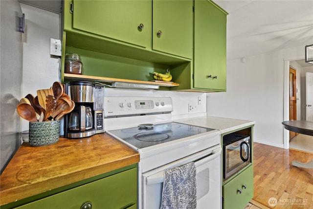 1220 S 313th St, Federal Way, WA 98003 - kitchen featuring white range with electric stovetop, green cabinetry, wood finished floors, and open shelves
