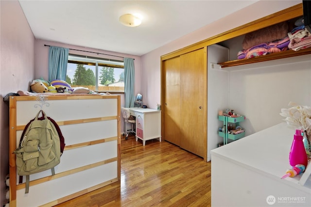 1220 S 313th St, Federal Way, WA 98003 - bedroom featuring light wood-type flooring and a closet