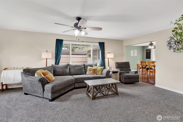 825 Main St, Lynden, WA 98267 - carpeted living room featuring ceiling fan and baseboards