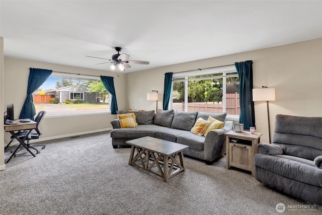 825 Main St, Lynden, WA 98267 - living area with plenty of natural light, carpet, ceiling fan, and a desk
