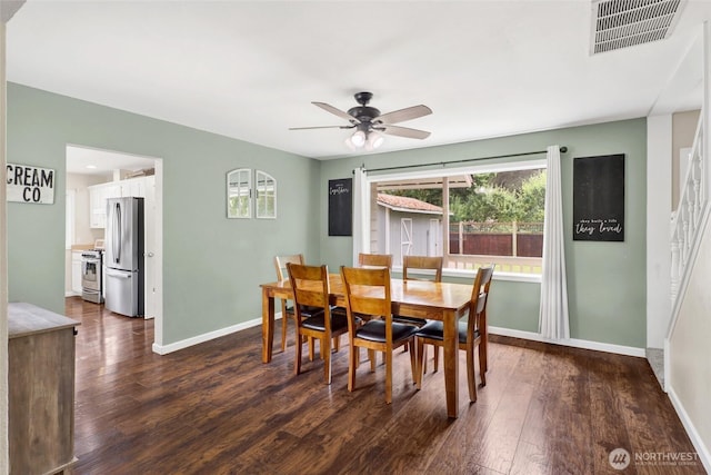 825 Main St, Lynden, WA 98267 - dining area featuring a ceiling fan and dark wood-style floors