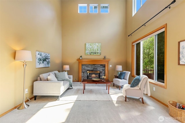 18328 10th Dr SE, Bothell, WA 98012 - carpeted living room with a high ceiling, healthy amount of natural light, and a stone fireplace
