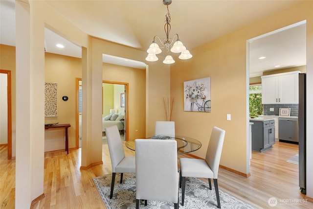18328 10th Dr SE, Bothell, WA 98012 - dining space featuring light wood-style floors and a chandelier