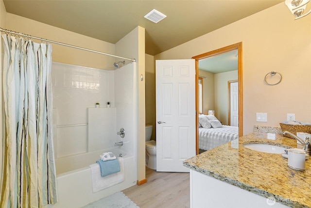 18328 10th Dr SE, Bothell, WA 98012 - full bath with vanity, wood finished floors, and shower / bathtub combination with curtain