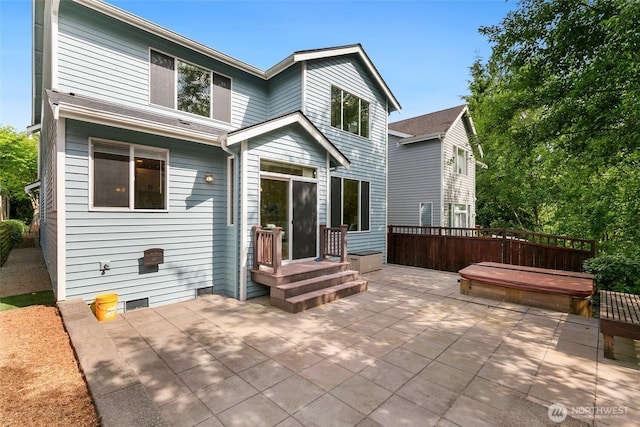 18328 10th Dr SE, Bothell, WA 98012 - back of property with a patio area and a covered hot tub