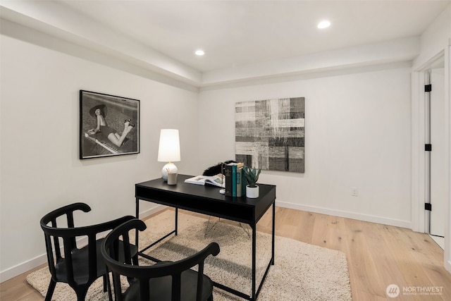 5606 23rd Ave SW, Seattle, WA 98106 - home office featuring light wood-style flooring and recessed lighting