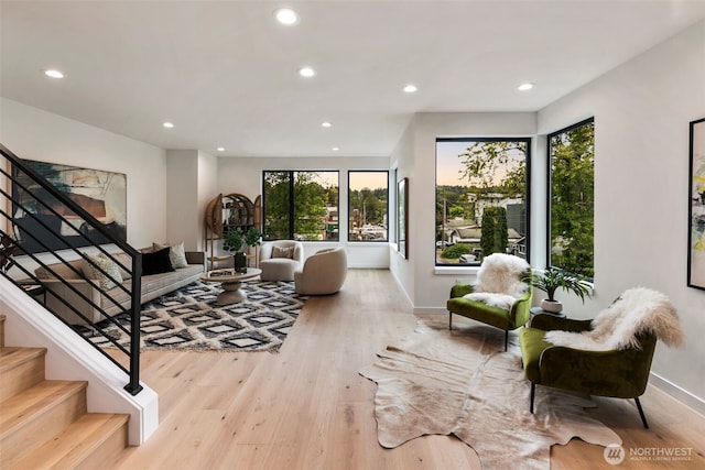 5606 23rd Ave SW, Seattle, WA 98106 - living room with recessed lighting, stairway, and wood finished floors