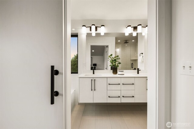 5606 23rd Ave SW, Seattle, WA 98106 - full bathroom with double vanity, a stall shower, tile patterned floors, and a bath