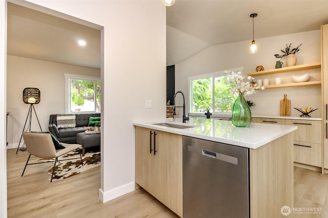 21241 S 29th Ave, Seatac, WA 98198 - kitchen with stainless steel dishwasher, modern cabinets, light brown cabinetry, light countertops, and vaulted ceiling