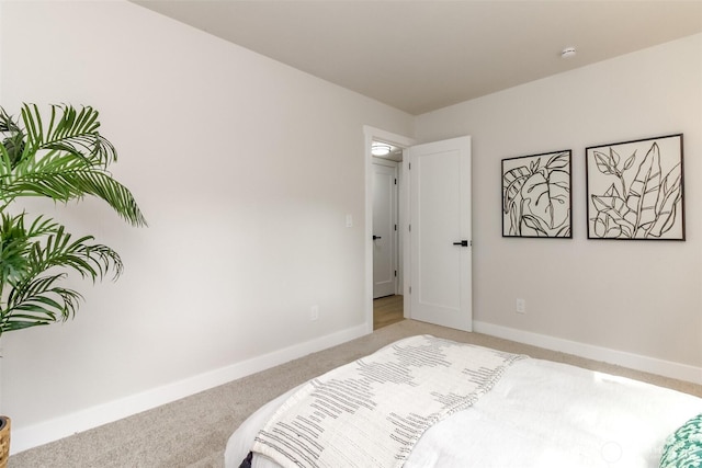 21241 S 29th Ave, Seatac, WA 98198 - bedroom featuring light carpet and baseboards