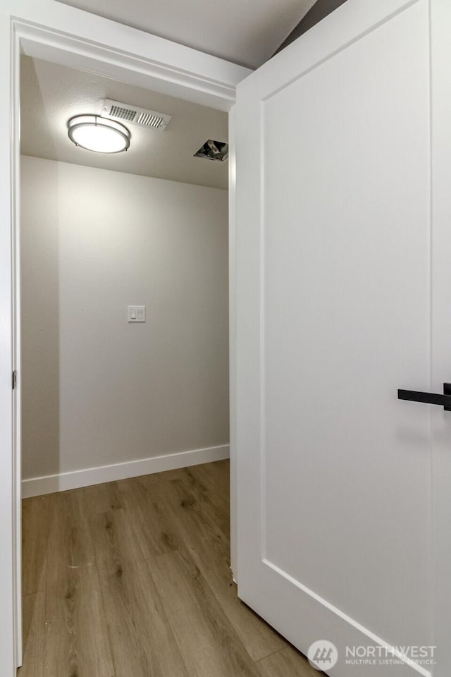 21241 S 29th Ave, Seatac, WA 98198 - hall with wood finished floors and baseboards