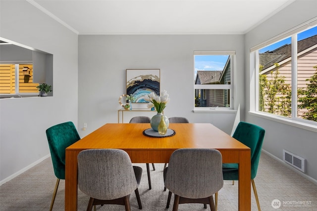1812 25th Ave Unit C, Seattle, WA 98122 - carpeted dining area featuring plenty of natural light and crown molding