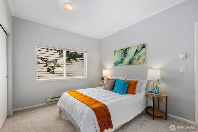 1812 25th Ave Unit C, Seattle, WA 98122 - bedroom with a baseboard radiator, carpet flooring, and a closet