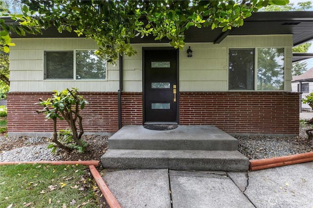10303 40th Ave E, Tacoma, WA 98446 - doorway to property featuring brick siding