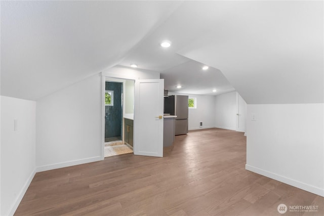 10303 40th Ave E, Tacoma, WA 98446 - additional living space with lofted ceiling, light wood finished floors, and recessed lighting