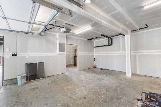 10303 40th Ave E, Tacoma, WA 98446 - garage with electric panel and a garage door opener