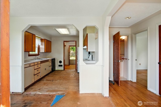 10022 8th Ave NE, Seattle, WA 98125 - kitchen featuring light countertops and light wood finished floors