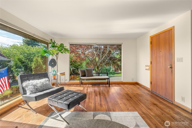 2842 NW 67th St, Seattle, WA 98117 - sitting room with wood finished floors and baseboards
